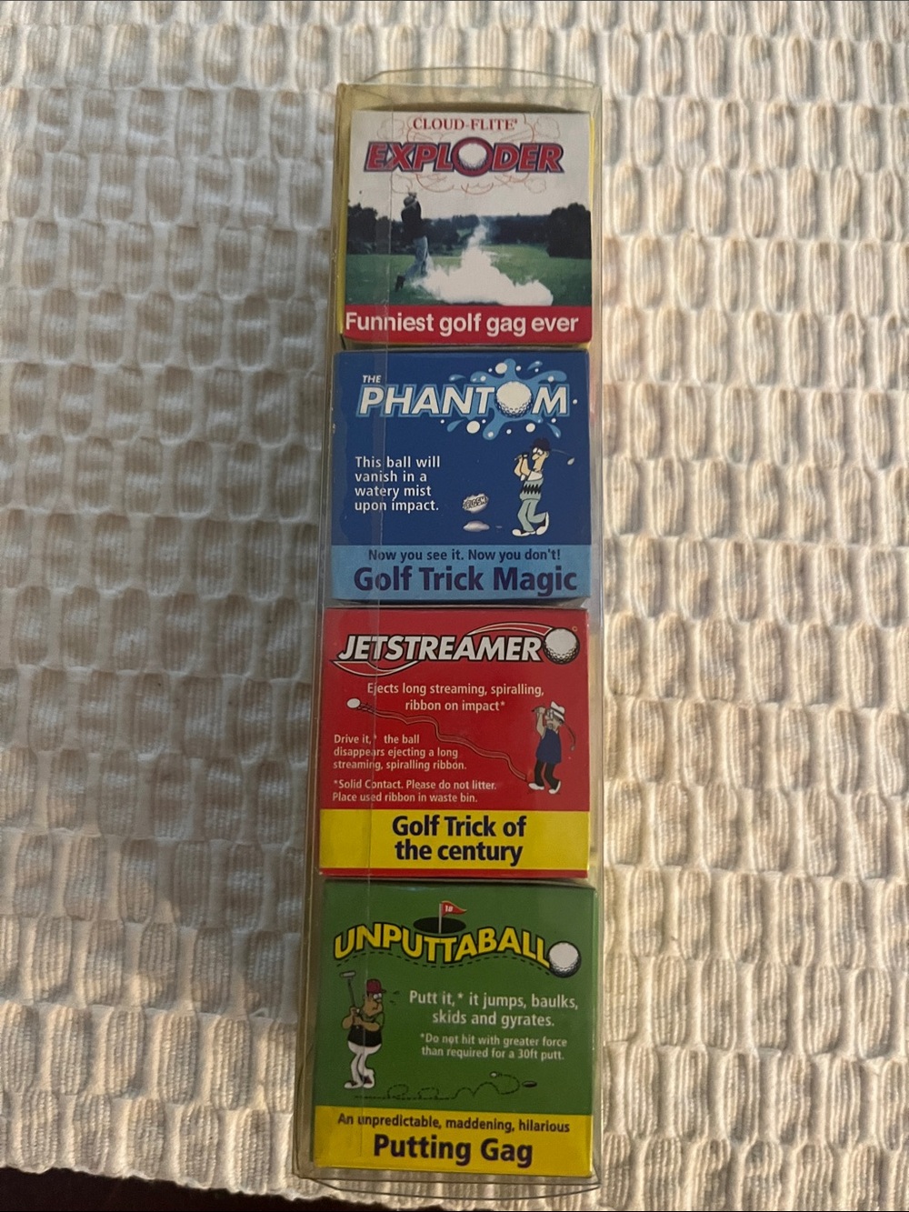 Pottery Barn Novelty Golf Trick Ball Gag Set – Red, Blue, Green, Yellow